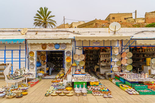 People visit the shops in medina (Old Town) of Essaouira, Morocco. The medina is a UNESCO World Heritage Site.