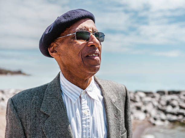 istock Senior black man sightseeing the lake 1488615846