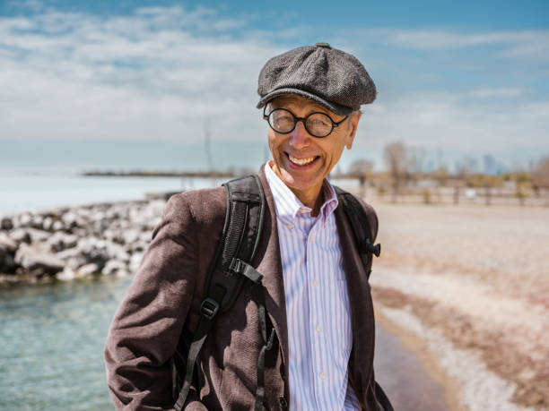 istock Senior man sightseeing the lake 1488615860
