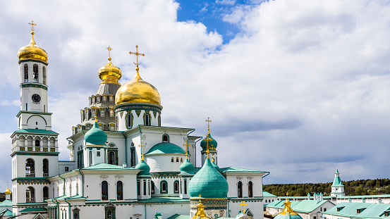 panoramic view of bell tower and domes of Resurrection Cathedral of New Jerusalem Monastery near Istra town in Moscow Region of Russia