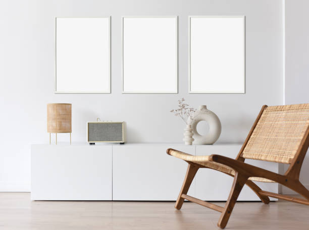 istock Artwork mockup in interior design. Blank picture frames on a wall. Vertical orientation 1488618019