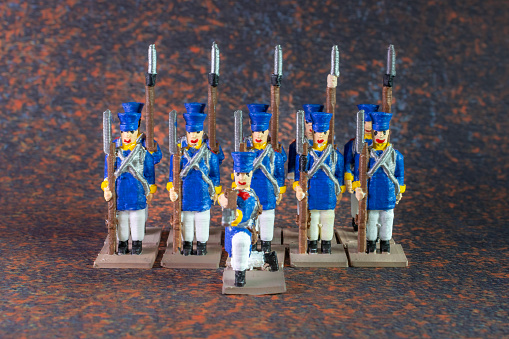 Plastic toy soldiers painted with colorful paints.