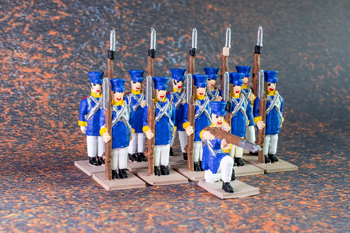 Plastic toy soldiers painted with colorful paints.