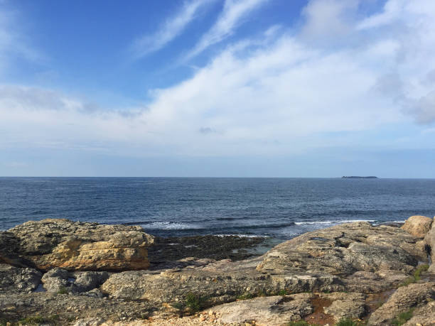 istock Coastline, rock, sea and sky background 1488625158