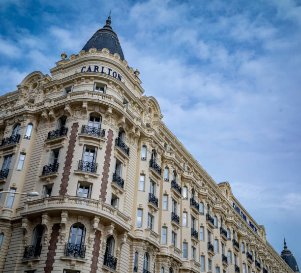 Views of the famous Carlton Hotel in Cannes, France.  First opened in 1911, the luxurious Carlton Hotel is located on the Boulevard de la Croisette overlooking the Mediterranean Sea and is emblematic of the Cote d'Azur.
