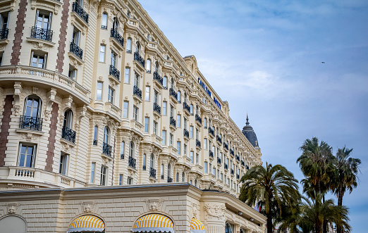 Views of the famous Carlton Hotel in Cannes, France.  First opened in 1911, the luxurious Carlton Hotel is located on the Boulevard de la Croisette overlooking the Mediterranean Sea and is emblematic of the Cote d'Azur.