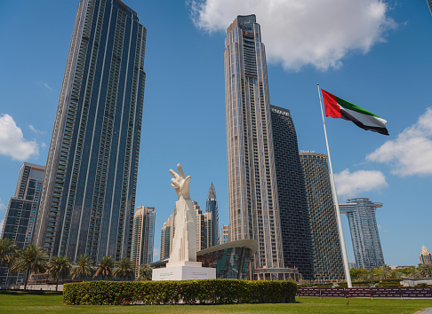 23 March 2023, Dubai, UAE: hand statue Declaration reads Art in all its types and colors reflects the culture of peoples, their history and civilization. from a poem by Sheikh Mohammed.