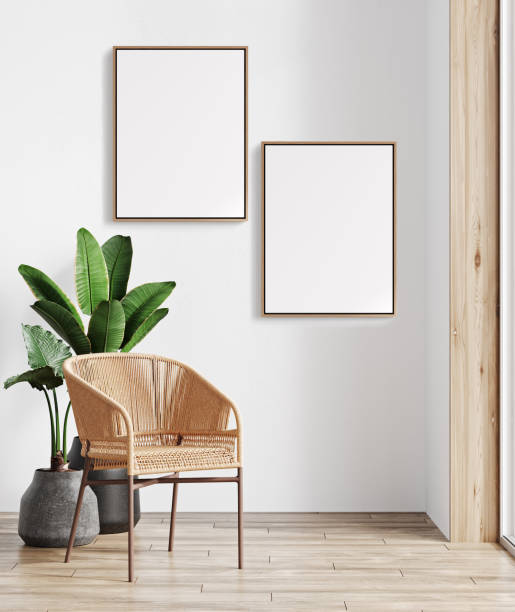 istock Mock up two vertical poster frames in boho interior background with white wall, armchair and plant, 3D render illustration 1488630559