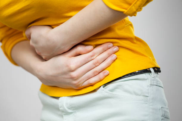 istock Woman suffer from belly pain. 1488635028