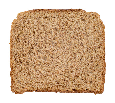 A slice of brown bread with cereals isolated. Multiple grain bread slice with clipping path stock photo