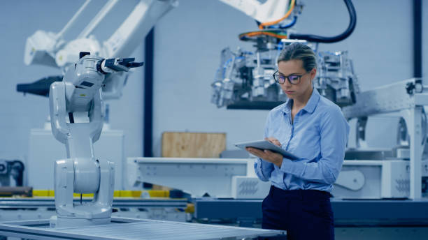 istock Engineering, robotic and machine for woman on tablet in lab research, analytics and automation. Futuristic technology, industry 4.0 and female engineer on digital tech for design, prototype and data 1488638523