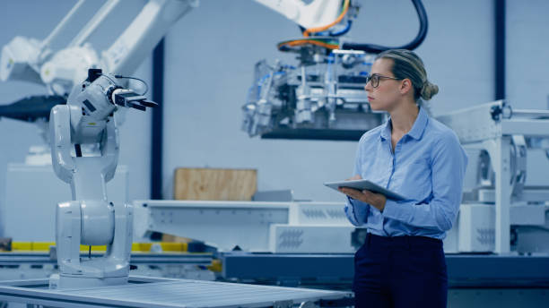 istock Robotic engineering, idea and woman on tablet for automation research, analytics and machine inspection. Futuristic technology, industry 4.0 and female engineer on digital tech for prototype lab test 1488640888