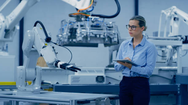 istock Robot automation, engineering and woman on tablet in lab for research, analytics and machine. Futuristic technology, industry 4.0 and female engineer on digital tech for internet, robotics and design 1488640892