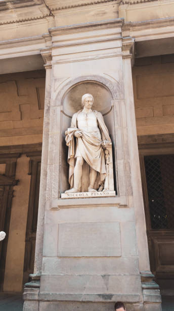 Niccola Pisano, Street sculpture Uffizi Gallery outside in Florence, Italy Niccola Pisano, Street sculpture Uffizi Gallery outside in Florence, Italy michelangelo italy art david stock pictures, royalty-free photos & images