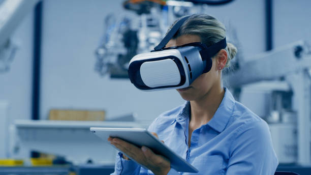 istock Engineering, virtual reality and woman on tablet for futuristic research, electronics or robotics research in industry 4.0. Technician person with vr software, digital tech and 3d automation machine 1488644041