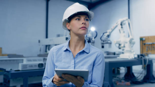 istock Tablet, machine and engineering woman in factory maintenance, programming or manufacturing of industry 4.0. Technician person thinking of robotics, electronics or automation on digital technology app 1488644078