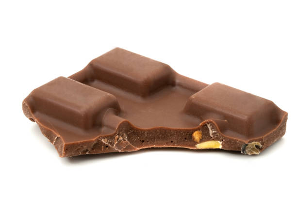 Tasty Chocolate Piece with pistachio isolated on white.