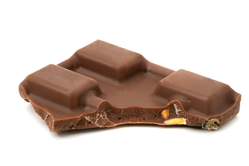 Kampen, The Netherlands - June 30, 2011: Twix candy bar isolated on a white background. Twix is a candy bar made by Mars, Inc., consisting of a biscuit finger, topped with caramel and coated in milk chocolate