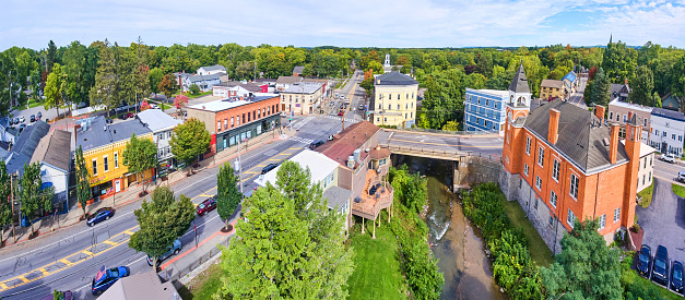 Image of Aerial panoramic view over small town in New York Honeoye Falls