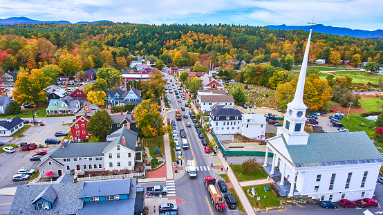 Image of Church aerial in small town of Stowe, Vermont during peak fall foliage