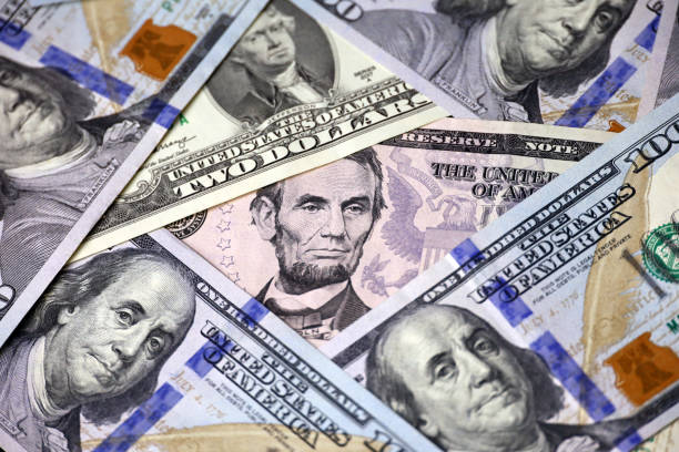 istock US dollar banknotes, paper currency for background 1488649303