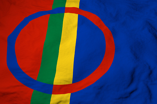 Full frame close-up on a waving Sami flag in 3D rendering.