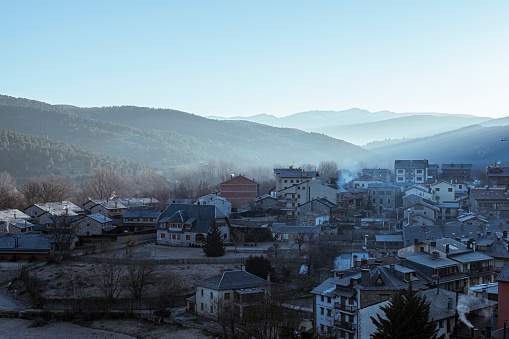 Beautiful winter Sunrise landscape on a mountain village in Bellver de Cerdanya, Girona, Catalonia