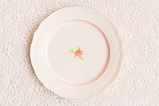 Closeup of porcelain plates and bowls