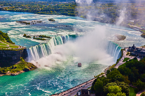 Image of Detailed view of entire Niagara Falls Horseshoe Falls from above in Canada with tourist ship by falls