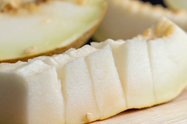istock Sliced orange sweet melon close up 1488664305