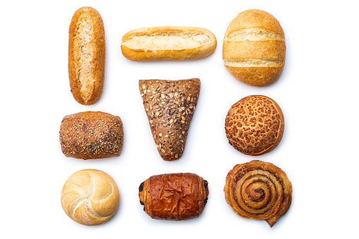 Freshly baked bread and buns collection isolated on white background