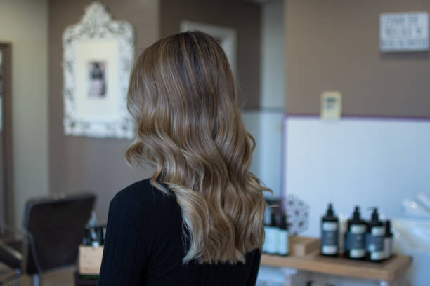 istock Attractive woman after a hairdressing session 1488664741