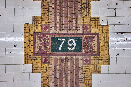Image of Mosaic on walls of 79th Street subway underground in New York City