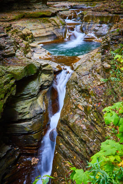 istock Multiple tiered waterfalls in river wind through gorge in New York during fall.jpg 1488665870