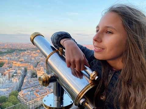 Girl enjoying a view over Paris