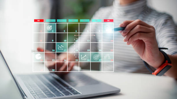 istock Analyst working with computer in management system to make report with KPI and metrics connected to database. corporate strategy for finance, operations, sales, marketing.Project management concept. 1488670421