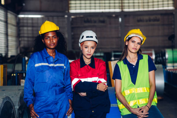 istock Foreman or worker work at factory site check up machine or products in site. 1488672535