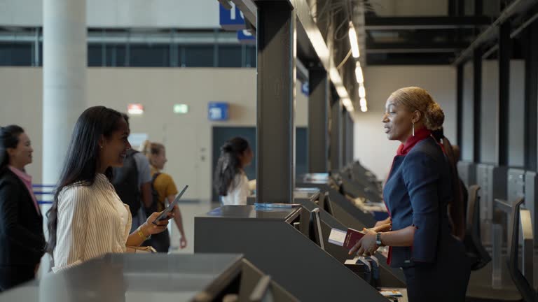 Young Woman Checking In at Airport Counter with Friendly Staff