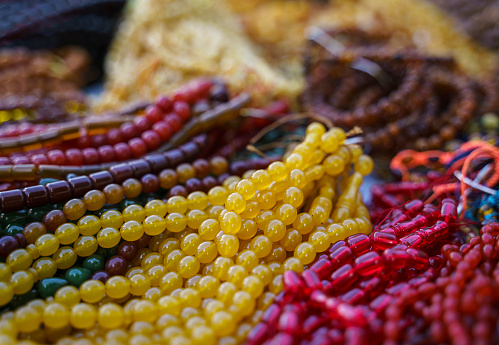Large group of colorful tesbih in a street bazaar in Ankara, Turkey. Close up shot