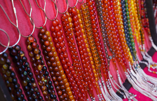 Large group of colorful tesbih in a street bazaar in Ankara, Turkey. Close up shot