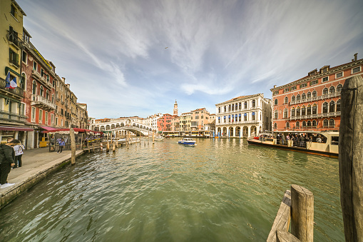 Venice, veneto, Italy: In the distance the Rialto Bridge over the Grand Canal.  The Grand Canal is the main canal that crosses the historic center of Venice.  About 3800 meters long,