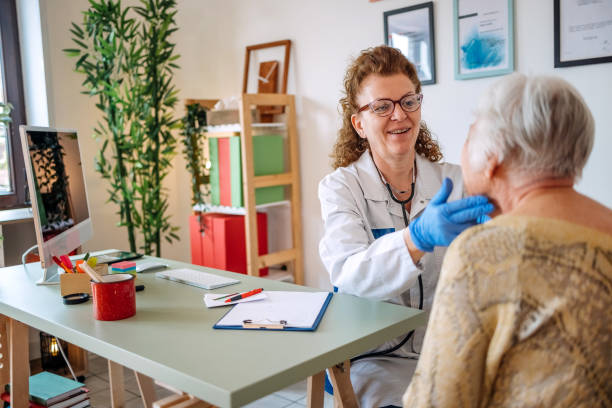 istock Old people at doctor visit 1488676203