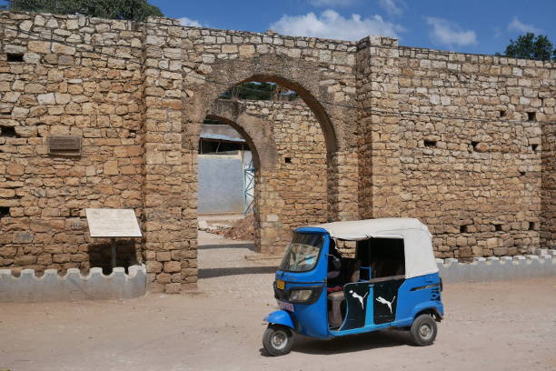 Harar, Ethiopia – 11.04.2022: auto rickshaw parked outside the old city walls stock photo