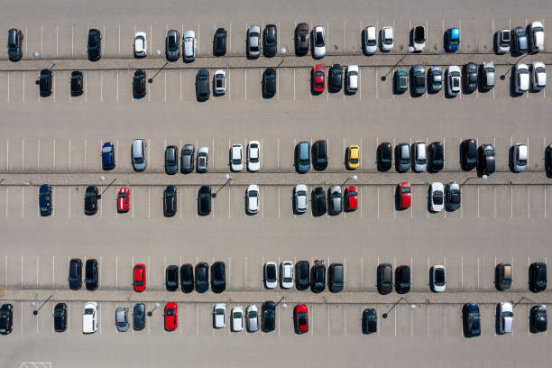 istock Parking lot with cars from above 1488685938