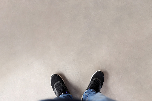 Feet standing on the ground