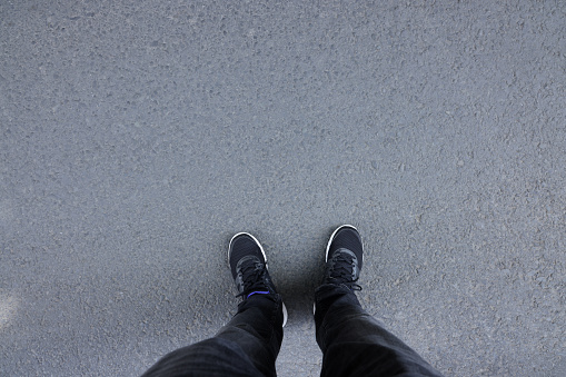 Feet standing on the ground