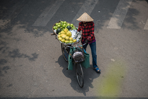 Local street vendor in Hanoi street, Vietnam