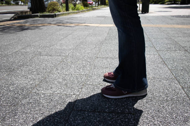 istock Woman's foot standing on the street Part 2 1488695719