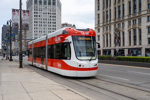 Detroit, Michigan, May 7, 2023: A street car on Woodward Avenue, part of the Qline street car system.