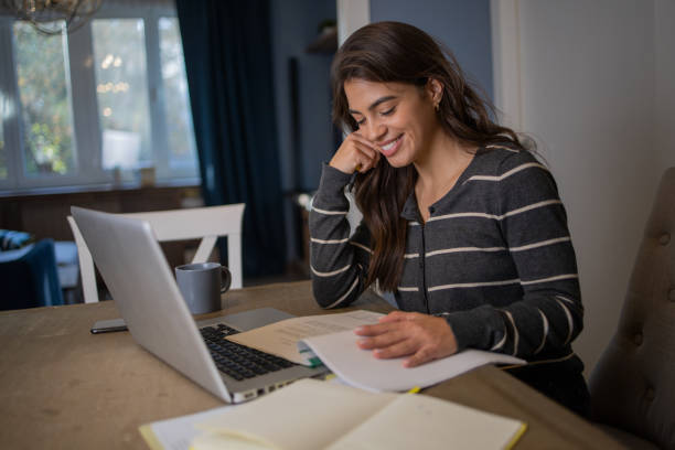 istock Young woman working from home 1488700011